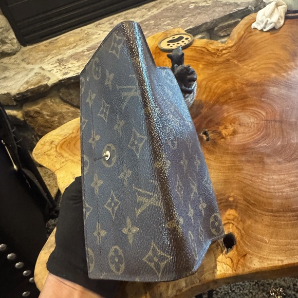 Louis Vuitton
Vintage 1996 Sarah Wallet monogram, snap closure pre-loved - Picture 14 of 16